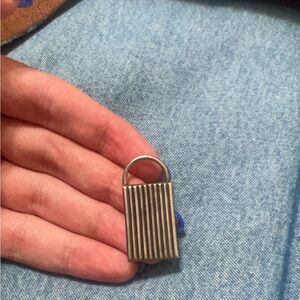 stamped lock pendant
